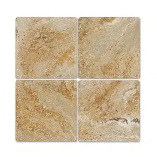 Four Valencia Travertine 12X12 Tumbled tiles showcasing natural stone texture