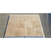 Beige travertine tile arrangement in Walnut Travertine 1/2X12 Pencil Liner design