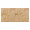 Two beige Walnut Travertine 18X18 Tumbled tiles showcasing elegant texture