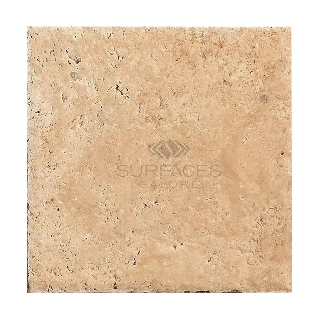 Beige travertine tile in Walnut Travertine 18X18 Unfilled, Brushed and Chiseled-Edge