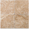 Four square Walnut Travertine 4X4 Tumbled tiles displayed together