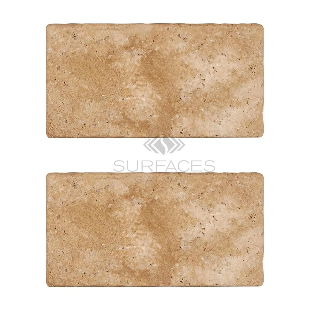 Two Walnut Travertine 6X12 Tumbled tiles showcasing natural elegance and texture