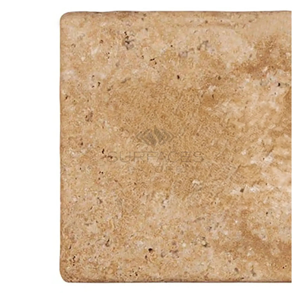 Walnut Travertine 6X12 Tumbled tile showcasing its natural porous texture