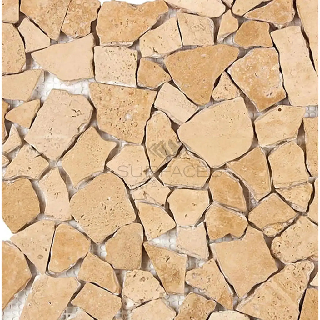 Irregularly shaped beige stone mosaic in Walnut Travertine Flat Pebble Tile