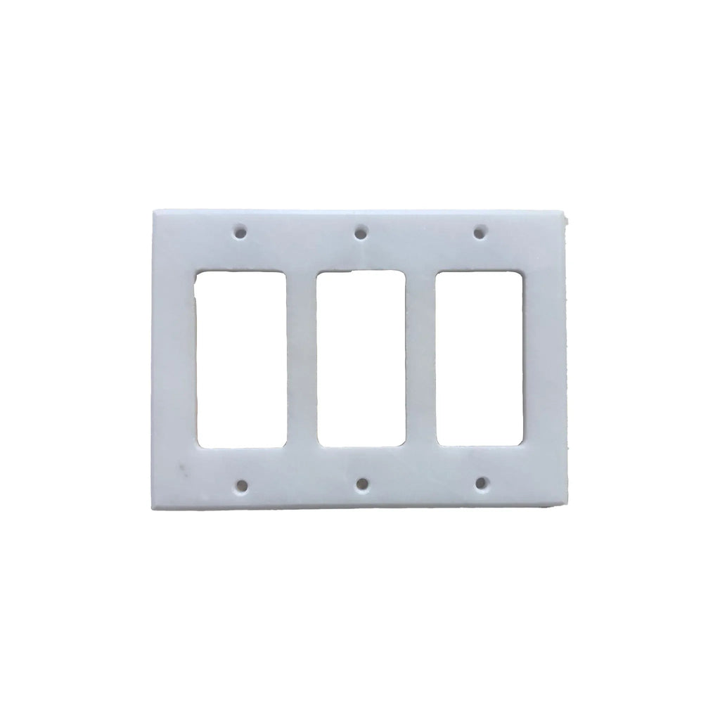 White marble wall plate featuring a triple rocker light switch design