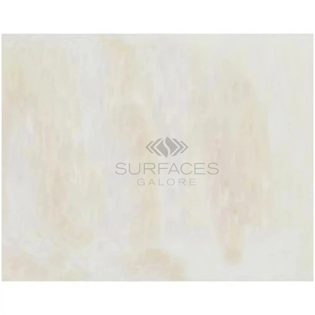 Creamy, marbled surface of White Onyx Bianco-Vanilla Cross-Cut 12X24 Marble Polished