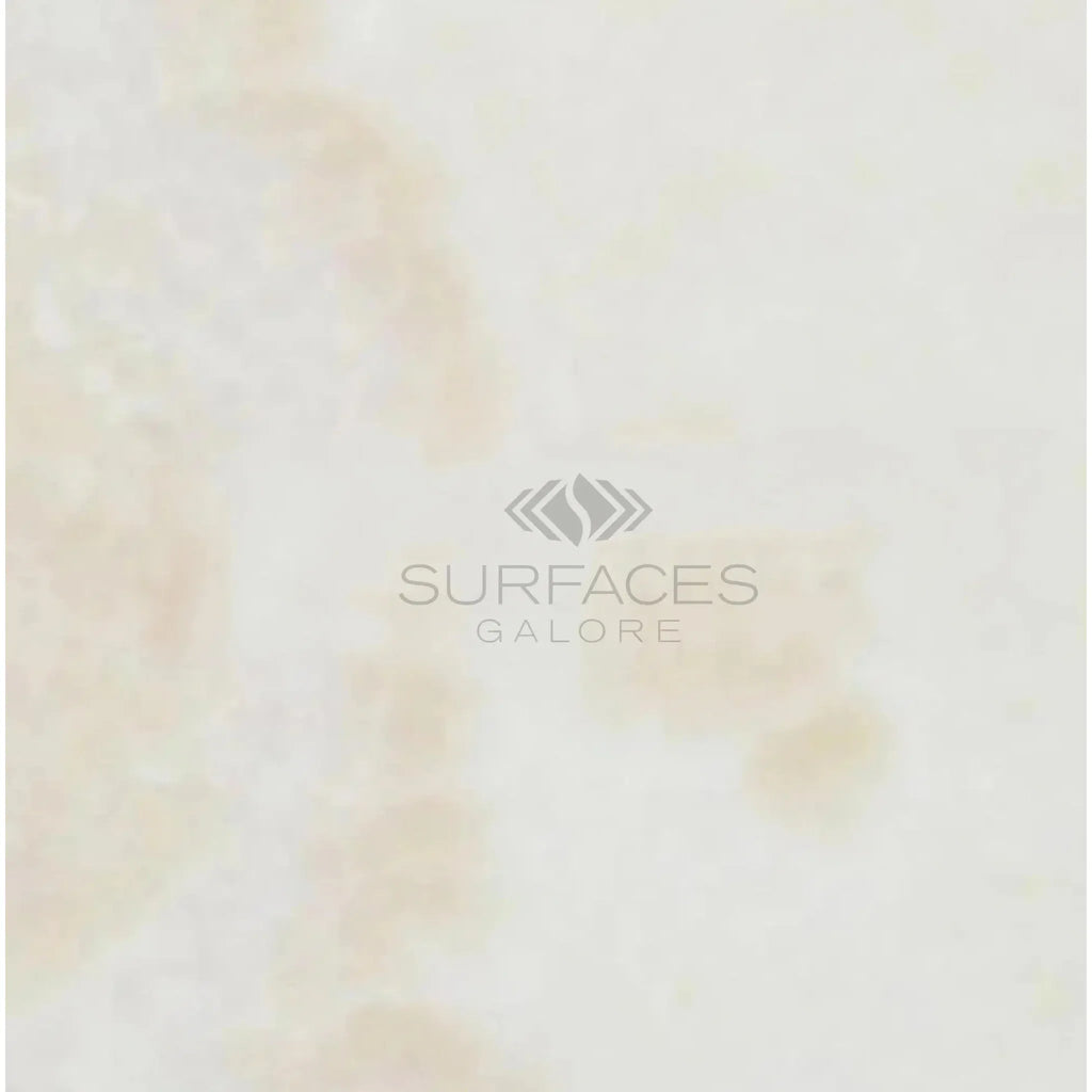 Creamy marble surface of White Onyx Bianco-Vanilla Cross-Cut 18X18 Polished tile