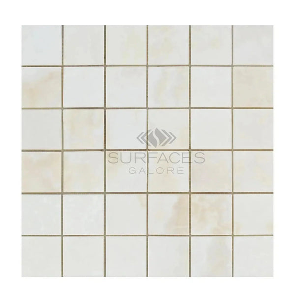 Square mosaic tile pattern in White Onyx Bianco-Vanilla Cross-Cut 2X2 polished marble