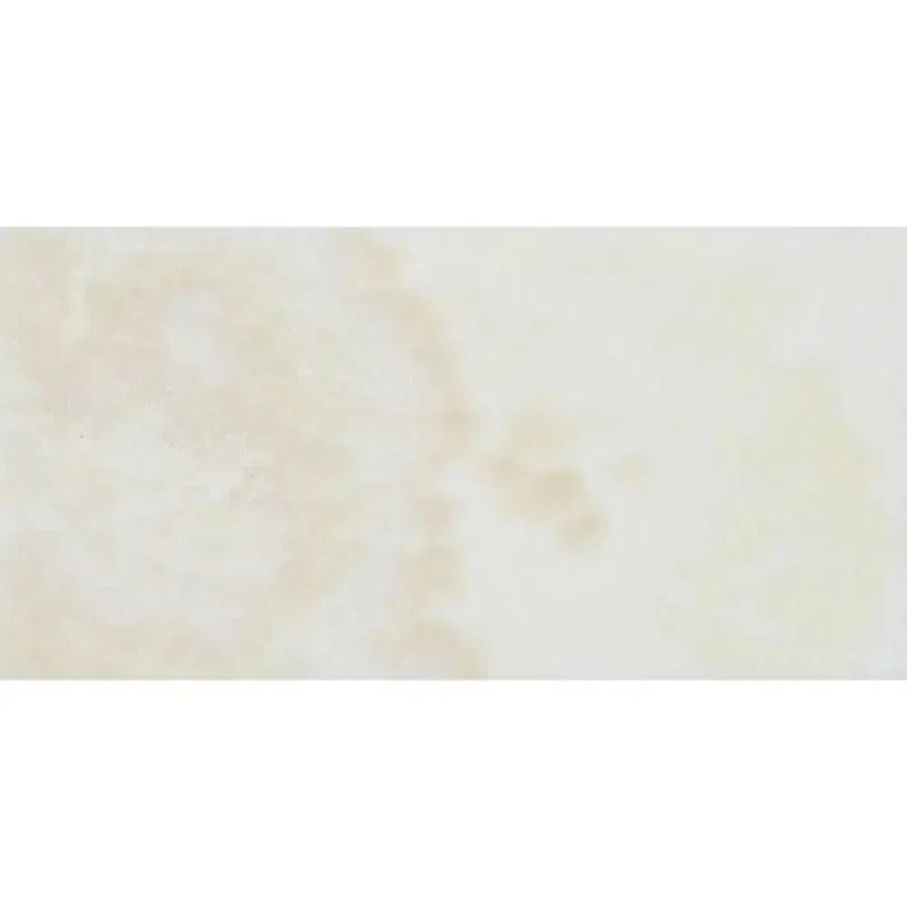 Creamy marble-like surface of White Onyx Bianco-Vanilla Cross-Cut 3X6 Marble Polished