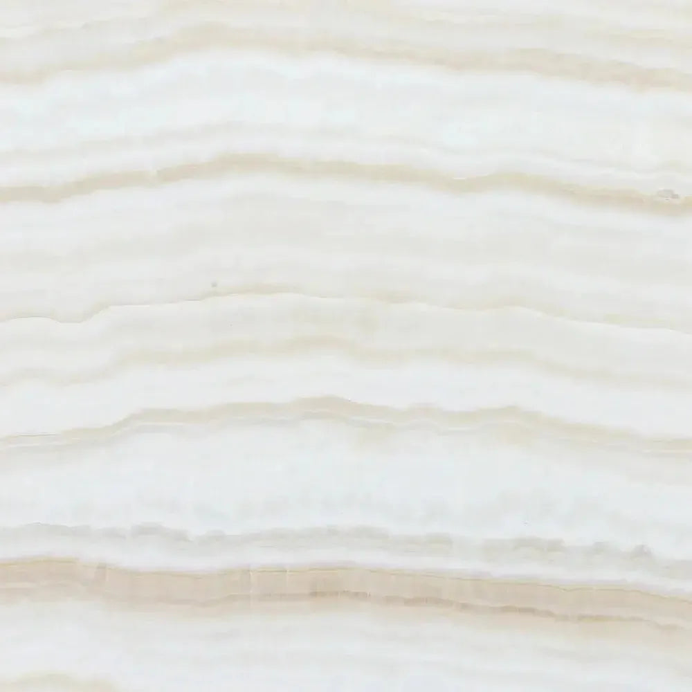 Creamy, layered white onyx stone texture in Bianco-Vanilla marble tile