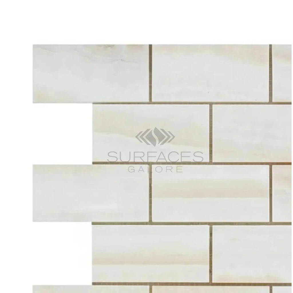 Rectangular cream-colored tile pattern in White Onyx Bianco-Vanilla Vein-Cut Mosaic