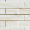 Rectangular cream-colored tile pattern of White Onyx Vein-Cut 2X4 Mosaic Marble Polished