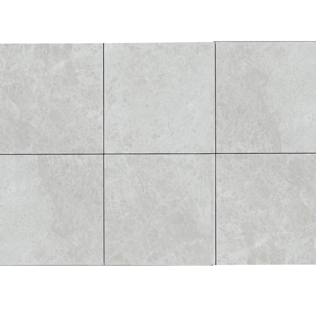 Six light gray square tiles from White Pearl/Botticino Beige Marble 12X12 collection