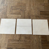 Three light-colored square tiles of White Pearl Botticino Beige Marble 18X18