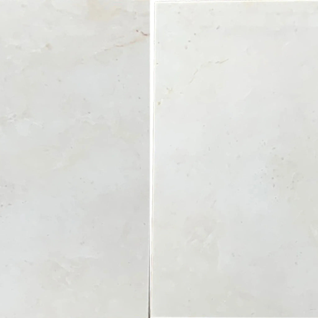 Two light-colored marble tiles featuring White Pearl and Botticino Beige finish