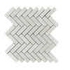 Herringbone pattern of White Pearl and Botticino Beige marble tiles in polished finish