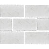 White textured brick pattern showcasing White Pearl/Botticino Beige Marble 3X6 Tumbled