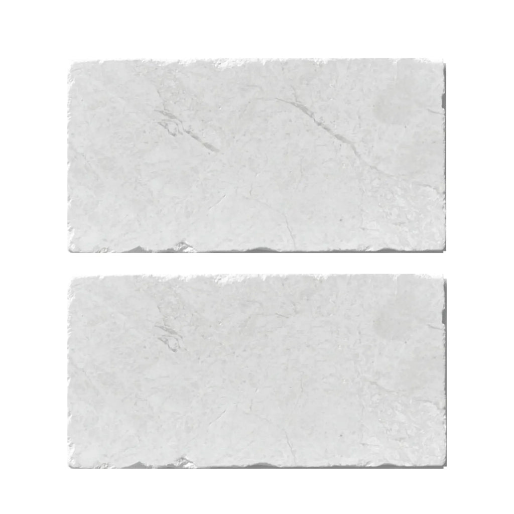 Two textured white stone tiles from the White Pearl/Botticino Beige Marble collection