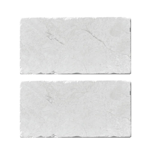 Two textured white stone tiles from the White Pearl/Botticino Beige Marble collection