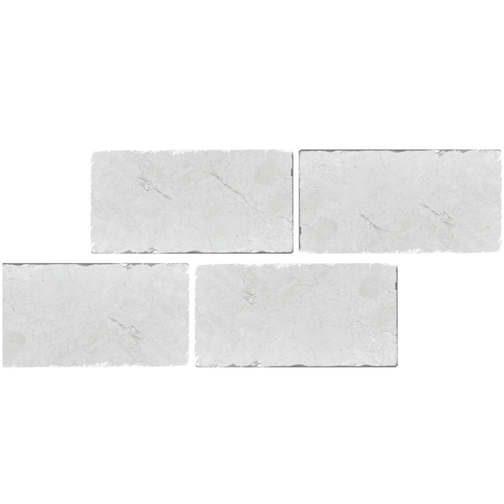 Four rectangular white tiles of White Pearl Botticino Beige Marble 3X6 Tumbled