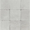 Square gray stone tiles from the White Pearl/Botticino Beige Marble collection