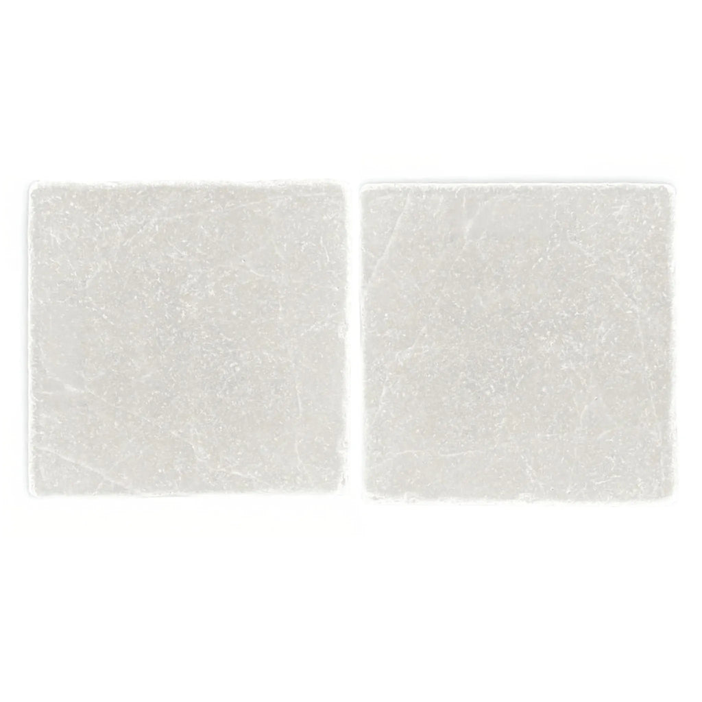 Two square white marble tiles from White Pearl/Botticino Beige Marble 4X4 Tumbled