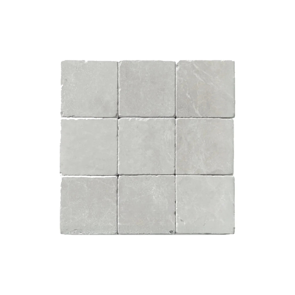 Nine square gray tiles of White Pearl Botticino Beige Marble 4X4 Tumbled