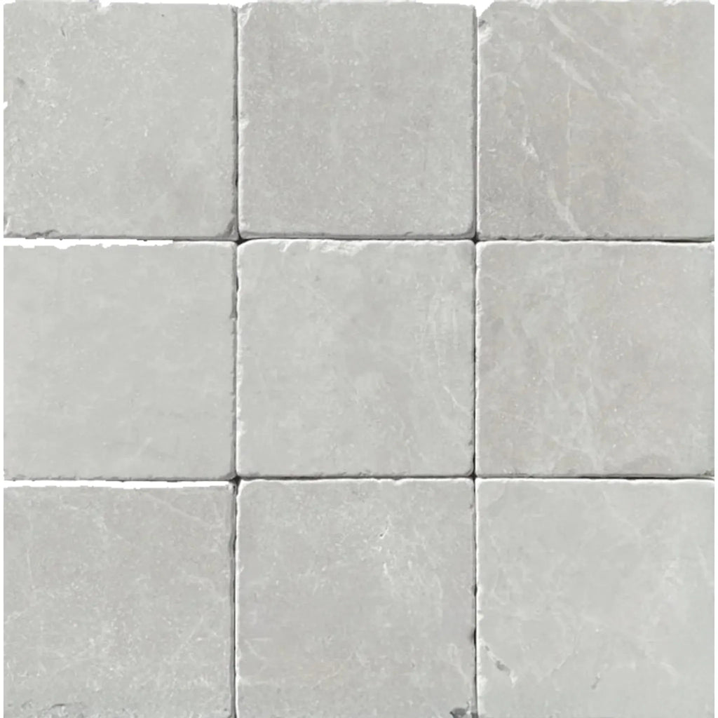 Nine square gray tiles of White Pearl/Botticino Beige Marble 4X4 Tumbled