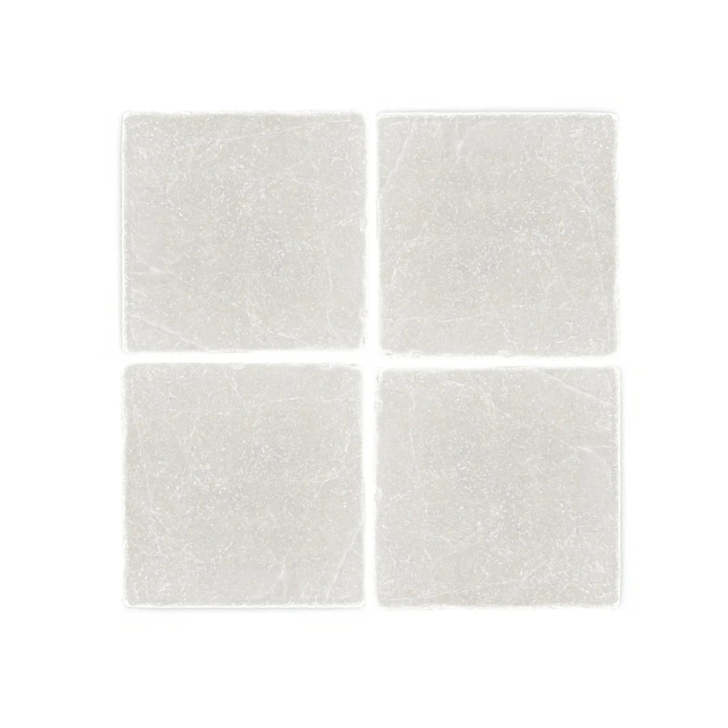 Four square white tiles of White Pearl/Botticino Beige Marble 4X4 Tumbled